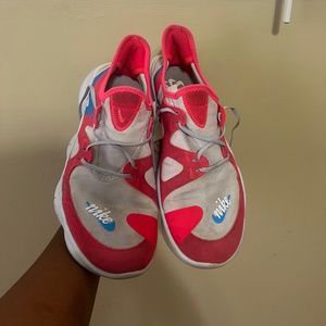 Pink and Grey Nike Free shoes